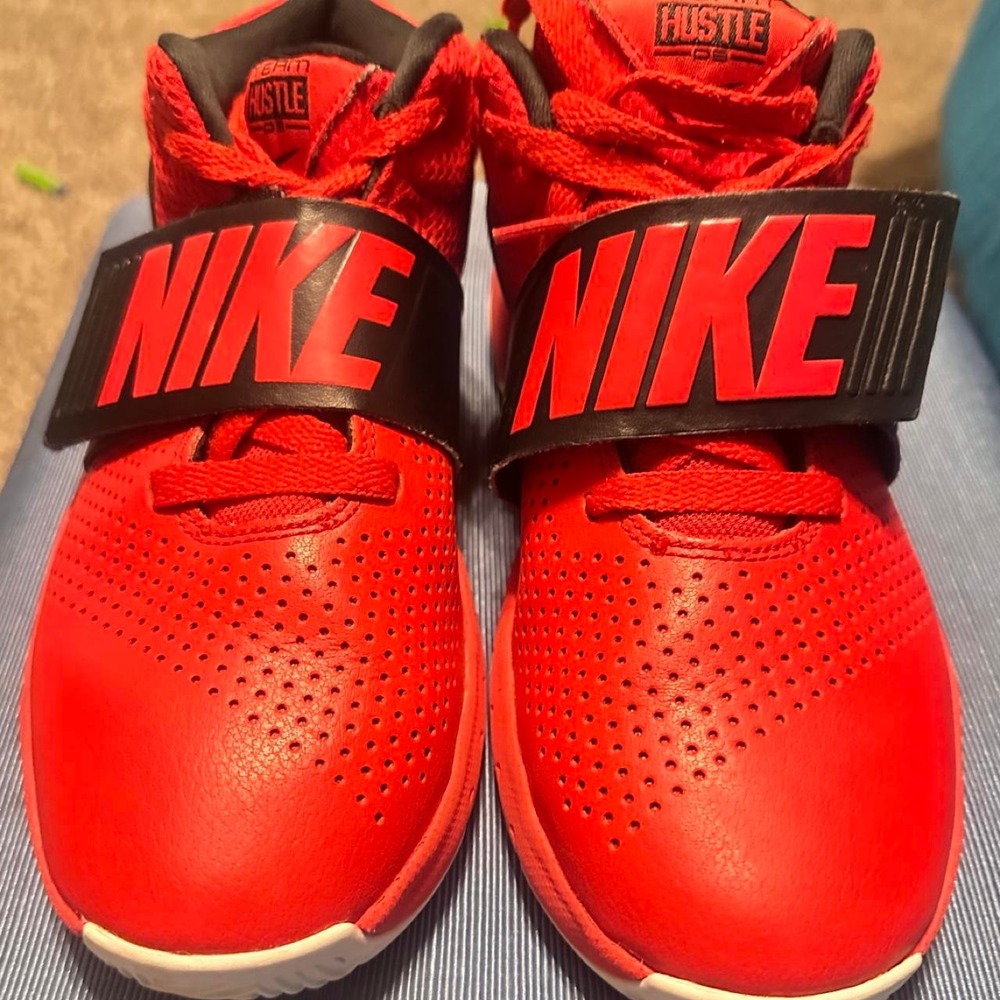 Nike Hustle 2.0 red basketball shoes size US 5Y tie and Velcro'